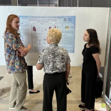 student presenting poster